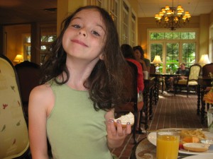 Laurel, eating a bagel.